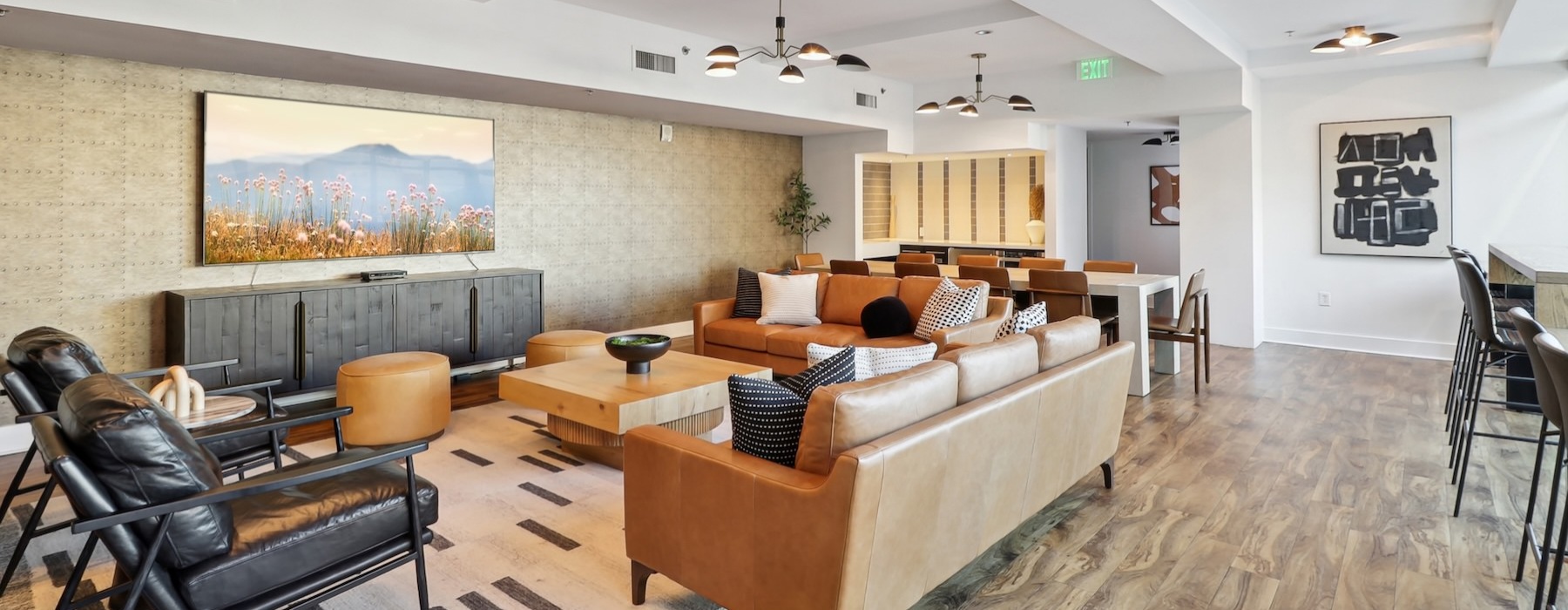 a lounge with couches, tables and chairs